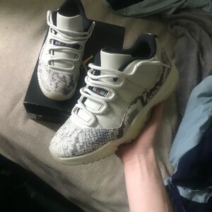 Retro 11 low “bone snakeskin”